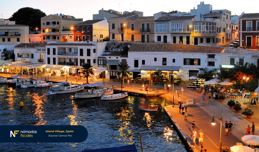 Island Village in Spain with sunlit coastal homes and Mediterranean architecture — a top lifestyle destination. Ideal setting for digital nomads benefiting from Spain's Beckham Law and low-tax options.