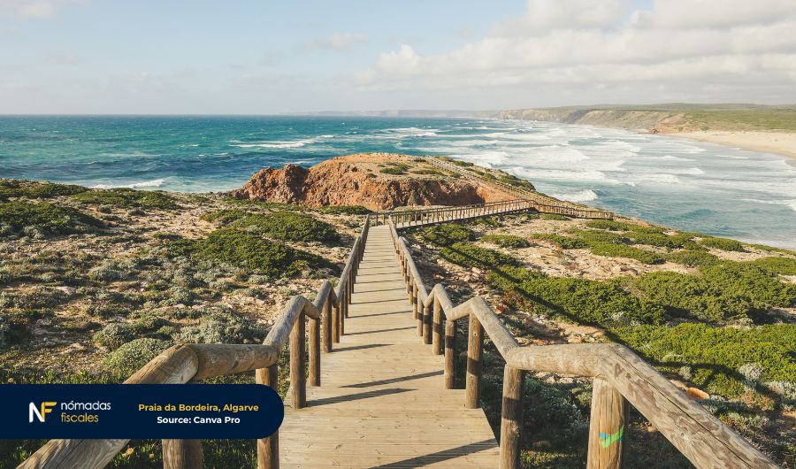 Wooden walkway leading to Praia da Bordeira in Algarve, Portugal — representing the natural beauty and lifestyle appeal of Portugal’s new NHR 2.0 (IFICI) tax regime.